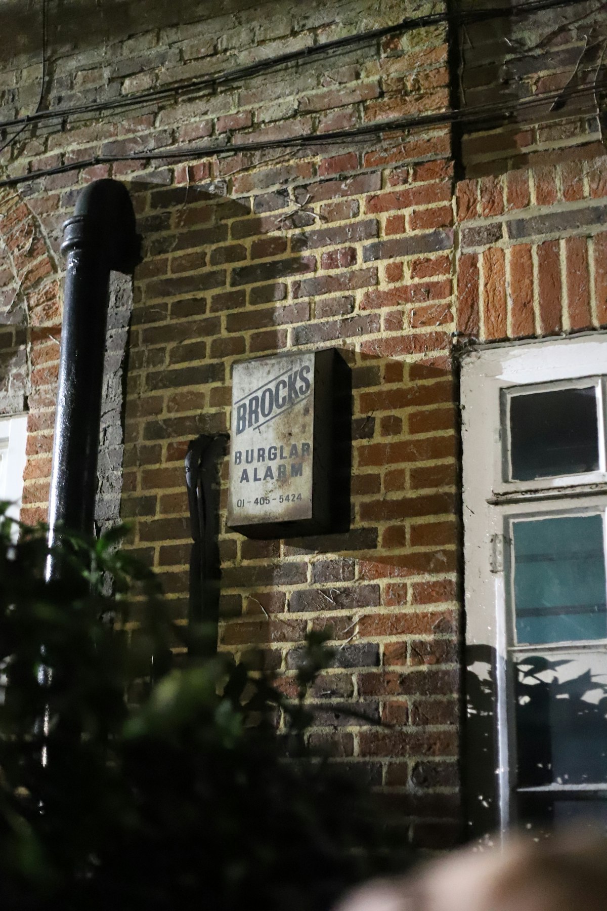 Alarm keypad next to a front door