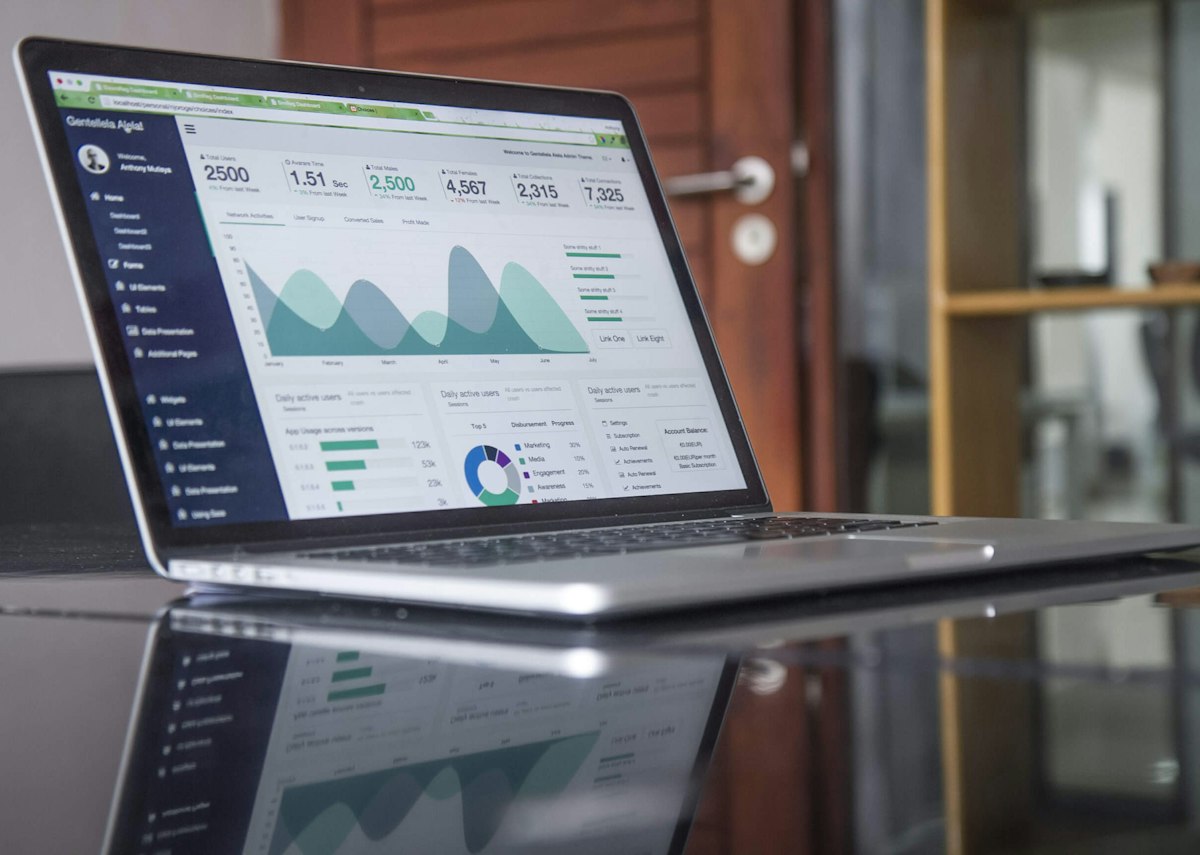 Spreadsheet with figures on a laptop