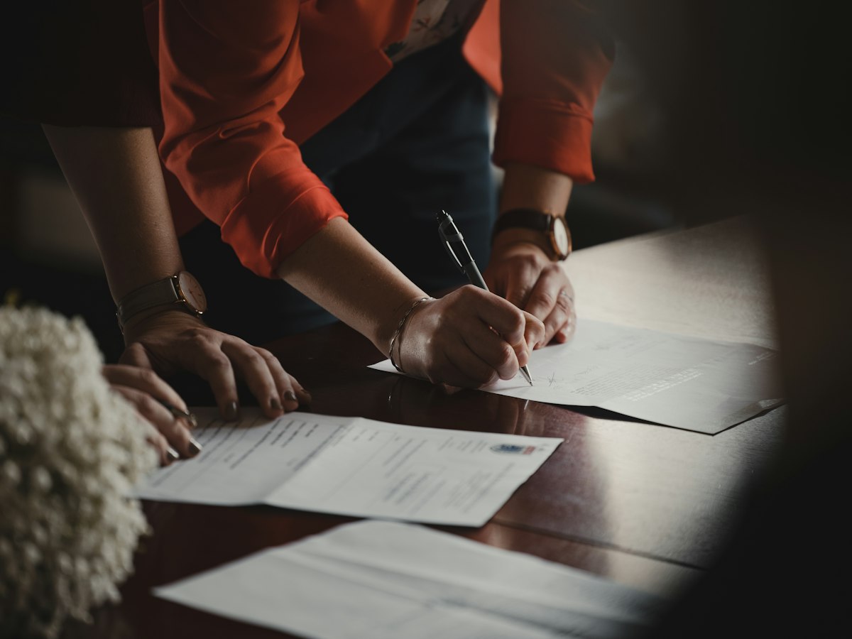 Commercial contract and pen on a table